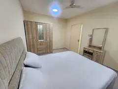 Room available for working couple in abu shagara sharjah