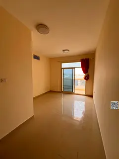 A room and a hall with a balcony and central air conditioning, close to all services in Al Jurf 3