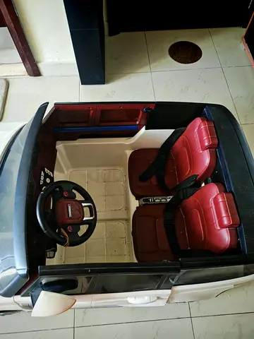 Urgent!! Kids Electric Ride-On Car with Two Seats with self drive and remote control both.