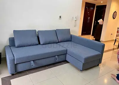 Ikea L shape sofa store cum bed and you can fix the storage lift or right