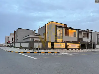 Corner villa, 5200 sq ft, two floors and a roof, price includes electricity, water and air conditioning, in one of the most prestigious areas of Ajman