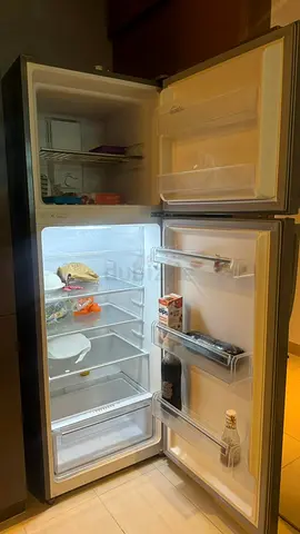 Used double-door refrigerator with freezer (good working condition)