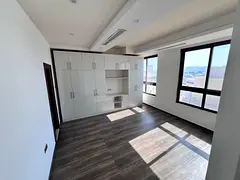 For those who appreciate elegance and distinction, a two-bedroom apartment with a living room in Al