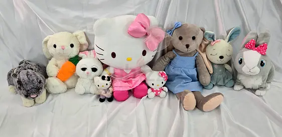 Lot of 9 Soft Plush Toys including Hello Kitty and assorted bunnies/bears - Good condition