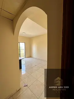 For rent in Al Nuaimiya 1: Two-bedroom apartment in a tower block, featuring two balconies, two bath