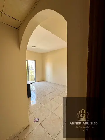 For rent in Al Nuaimiya 1: Two-bedroom apartment in a tower block, featuring two balconies, two bat