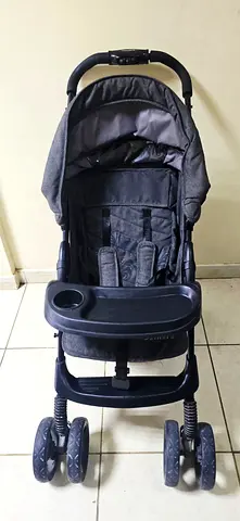 Lightly Used Grey Baby Stroller with Storage Basket
