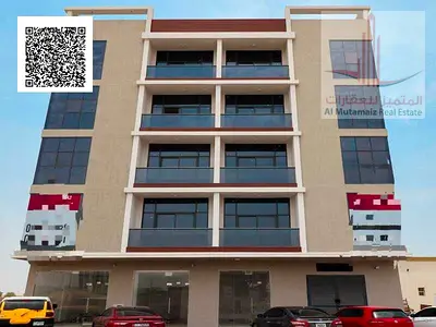 For sale in Al Alia, Ajman - Residential/commercial building with top specifications - Excellent annual income - Freehold ownership