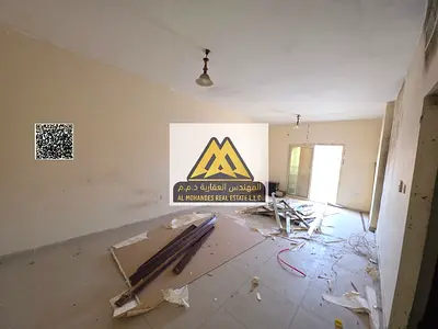 Apartment in Al Rashidiya 3, two bedrooms and living room, separate living room, 2 bathrooms, balcony, central AC, 38,000 yearly, 6 payments, next to
