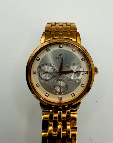 Titan Women 2569WAA Fashion Diamond Accent Gold Tone Quartz 34mm Watch