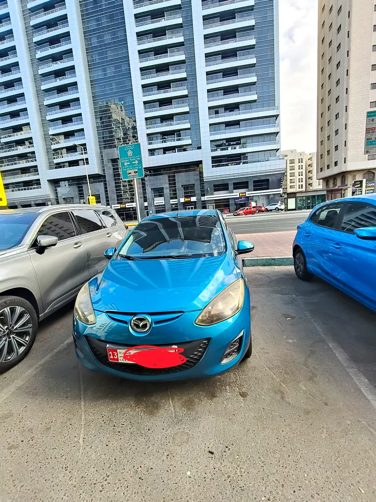 Mazda 2 2014 — photo 1 of 3
