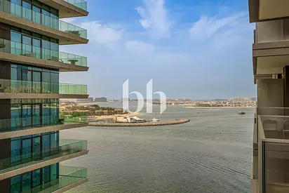 Furnished 1BR | Palm & Sea Views | Private Beach