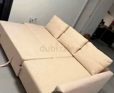 IKEA L shap Sofa store cum bed you can fix the storage lift or Right any side