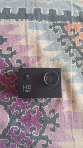 Compact HD 1080p Action Camera - Good Working Condition with SD card