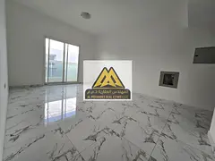 1BR + living room apartment in Al Rashidiya 2 Ajman, master bedroom, 2 baths, balcony, built-in ward