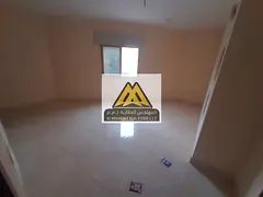 Studio for Annual Rent in Al Aliya | Semi-Separate Kitchen | Split AC | Prime Location