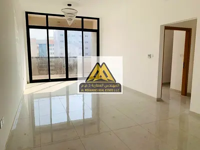 Brand new one-bedroom apartment with a living room and two bathrooms, first occupancy, located next to Ajman University and the Ajman Court, featuring