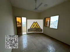Three-bedroom apartment for annual rent in Al Nuaimiya 2, Ajman – Prime location for families