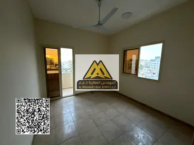 Three-bedroom apartment for annual rent in Al Nuaimiya 2, Ajman – Prime location for families