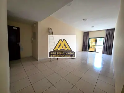 شقة غرفة وصالة للإيجار في الراشدية عجمان بلكونة إطلالة مفتوحة مساحة كبيرة موقع مميز بجوار أبراج الفالكون