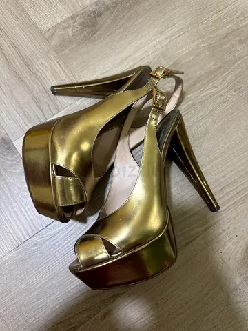 Gold platform peep-toe slingback high heels, size unknown - lightly used - brand Charles  keith