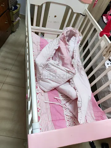 White Wooden Baby Crib with Pink Bedding - Good Condition