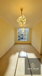 For rent in Al Nuaimiya: 2 bedrooms, living room, 2 bathrooms, balcony, central air conditioning, AE