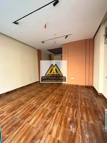 A Prime Commercial Opportunity on a Main Road in Al Nuaimiya Towers – Spacious Unit with Ready Kitchen for Immediate Business Operation