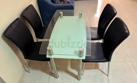 Glass Top Dining Table with 4 Black Faux Leather Chairs - Compact Set