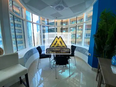 مكتب مفروش للإيجار في Horizon Towers عجمان | مساحة 820 قدم² + موقف سيارات