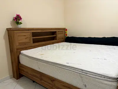 Wooden king Bed Frame with Built-in Headboard Storage (Good Condition)