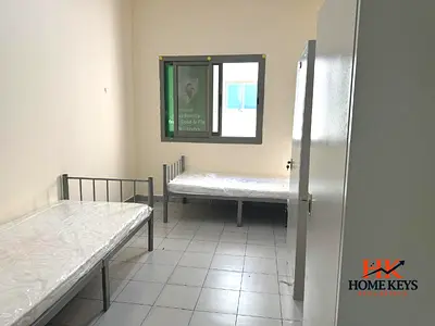 سكن عمال مطوّر بالكامل في DIP 2 | نظيف وشامل الخدمات