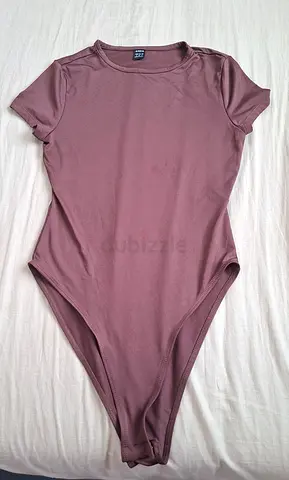 Mauve short-sleeve bodysuit, size S