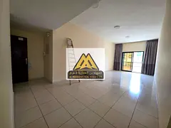 A spacious one-bedroom apartment with a large living hall is now available for annual rent in Al Ras