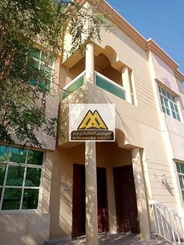 For annual rent: 5-bedroom villa in Al Muwaihat, 5 bathrooms. Prime location. Close to all services. Price: 110,000 (suitable for shared rentals) Or