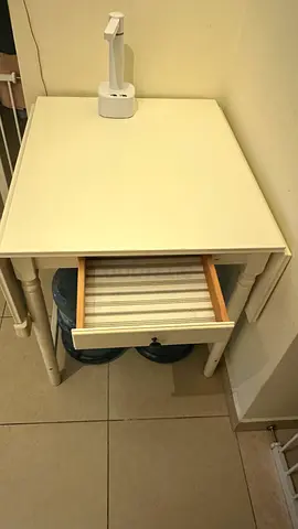 Small white bedside table with single drawer — good condition
