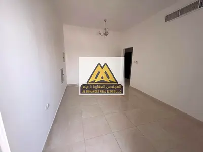 شقة غرفه وصالة ثاني ساكن بمساحة واسعة وبناية جديدة في الجرف 3 عجمان – غرفة ماستر، 2 حمام، بلكونة بانورامية، موقع مميز قريب من السوق الصيني