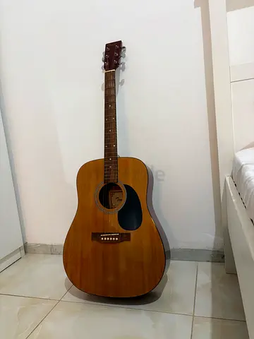 Used Full-Size Acoustic Guitar - Natural Wood Finish