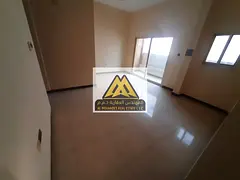 Two-bedroom apartment with a closed living room and balcony in Al Jurf Industrial Area 3, priced at
