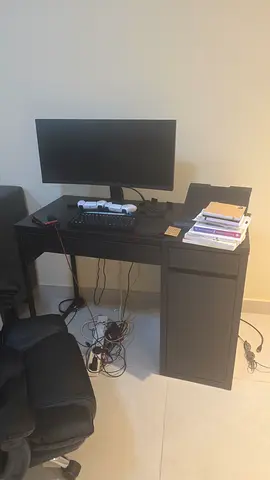 Used desktop setup with monitor and desk