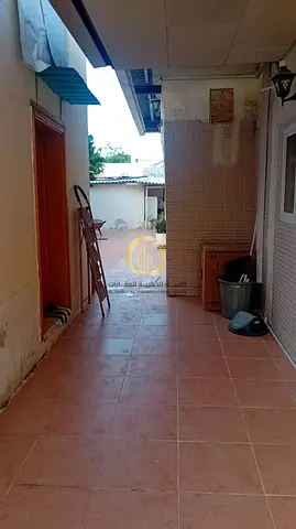 For sale: A house in Al Ghafia area, 8000 sq ft, consisting of 6 rooms and an annex with two rooms, a kitchen, and a maid's room.