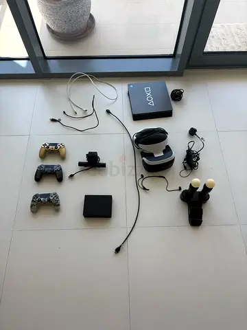 PlayStation VR headset + PS4 controllers and accessories + PS4 — good condition