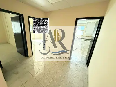 An apartment is available for annual rent in Al Nuaimiya 1, located directly on Sheikh Khalifa Street