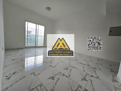 Apartment in Al Rashidiya 2 with a balcony, equipped with central air conditioning and built-in wardrobes. Features include a fantastic and very secur