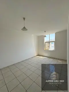 1BR Apartment- Balcony Open View - Central AC- Family Building - Spacious Layout AED 29K Annual Rent