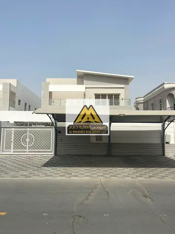 5 Bedroom Villa for Sale in Al Rawda 3 Ajman 7 Bathrooms Majlis 2 Living Rooms Maid Room 5000 Sqft Quiet Residential Location