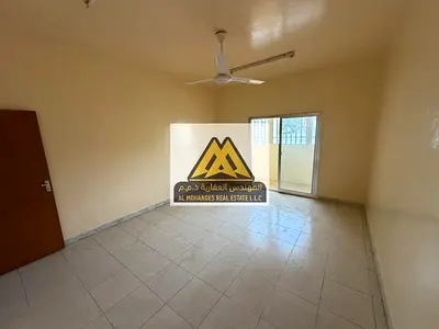A 2-bedroom apartment with living room and balcony is available for annual rent in Al Nuaimiya 2, Ajman. Well-maintained and ready for move-in, ideal