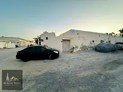Traditional Arabic house for sale in Sharjah / Al Qadisiyah, third plot from the main street, excell