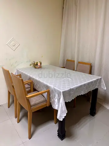 Dining Table with wooden chairs