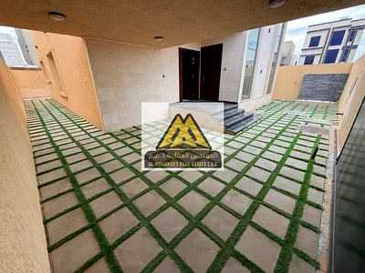فيلا فاخرة 5 غرف ماستر للإيجار – الباهية، عجمان | طابقين، حديقة، بلكونة كبيرة، غرفة خادمة، موقف سيارات مظلل، موقع مميز